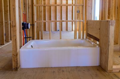 Contractor Installing Bathtub
